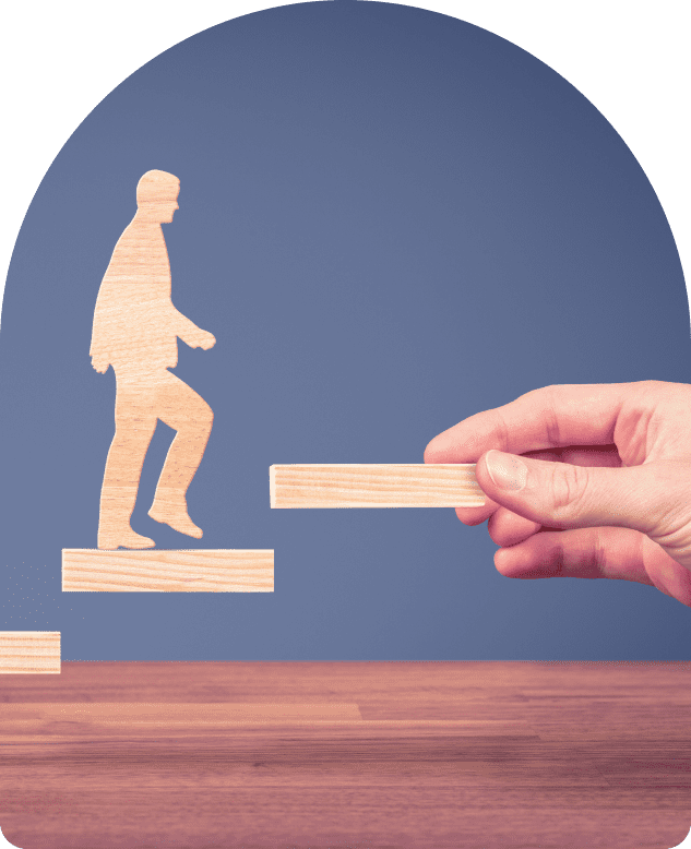 Wooden figure climbing career ladder.